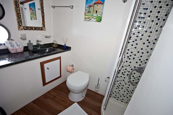 All cabins have en-suite bathroom including; enclosed shower cabin, house type toilet and hand washing basin.